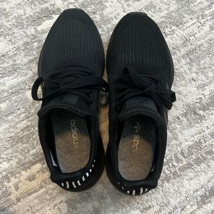 black Adidas athletic shoes